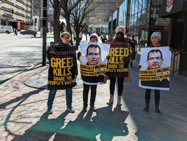 Health Gap activists protesting Moderna's greed in Boston